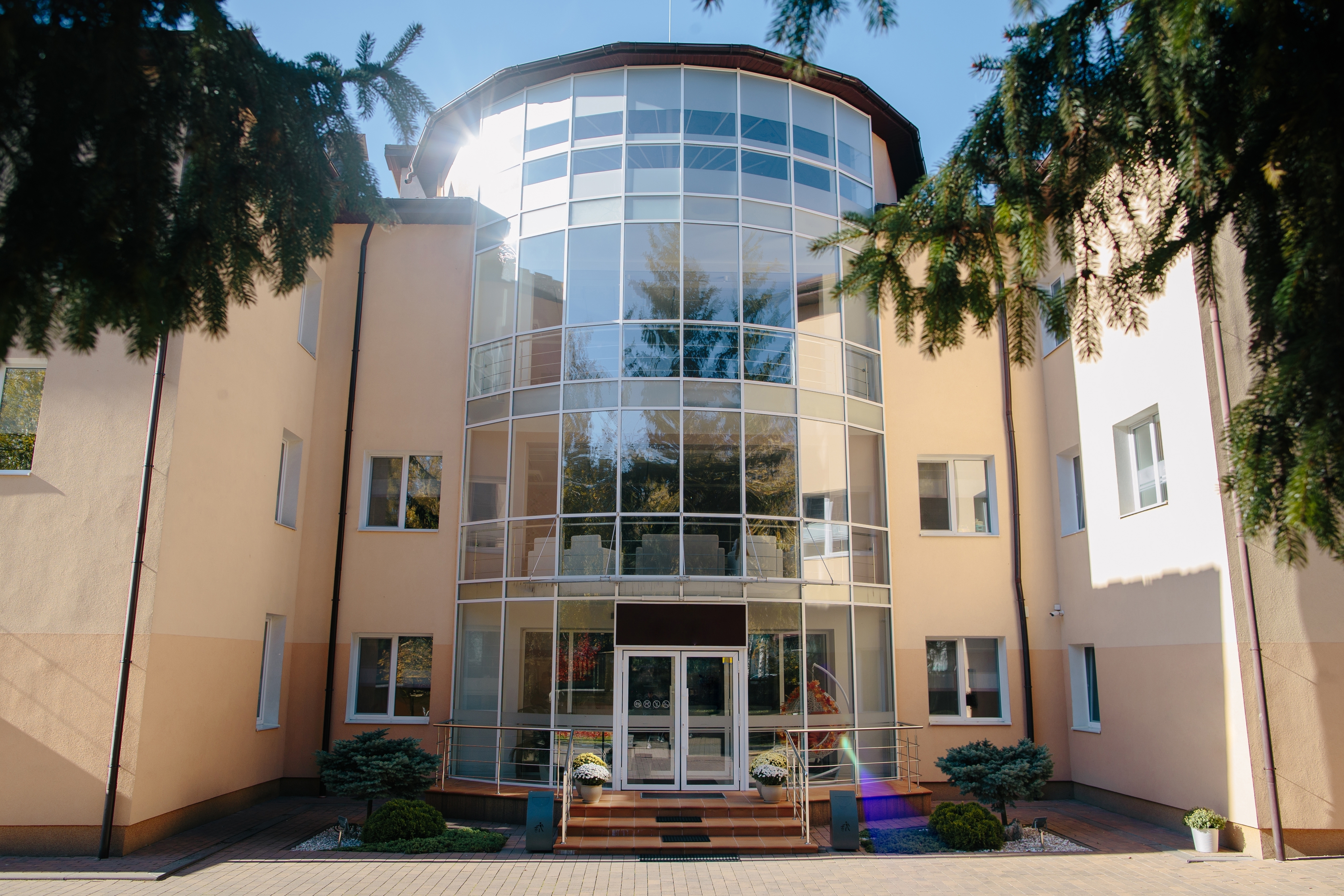Modern medical building with curved glass facade